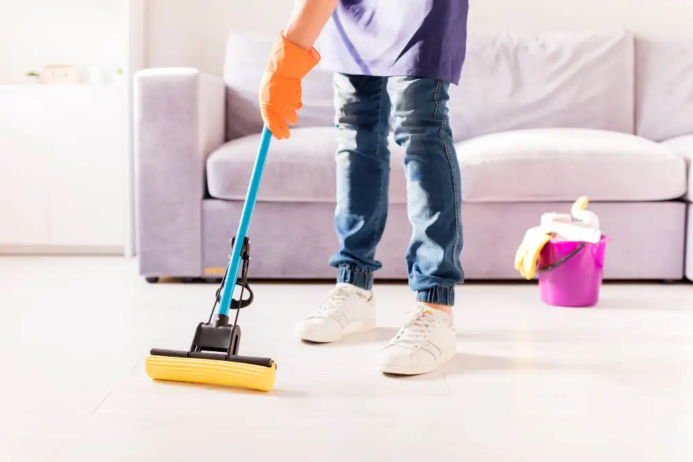 Floor mopping during full-flat end-of-tenancy clean on Barking Road, Canning Town